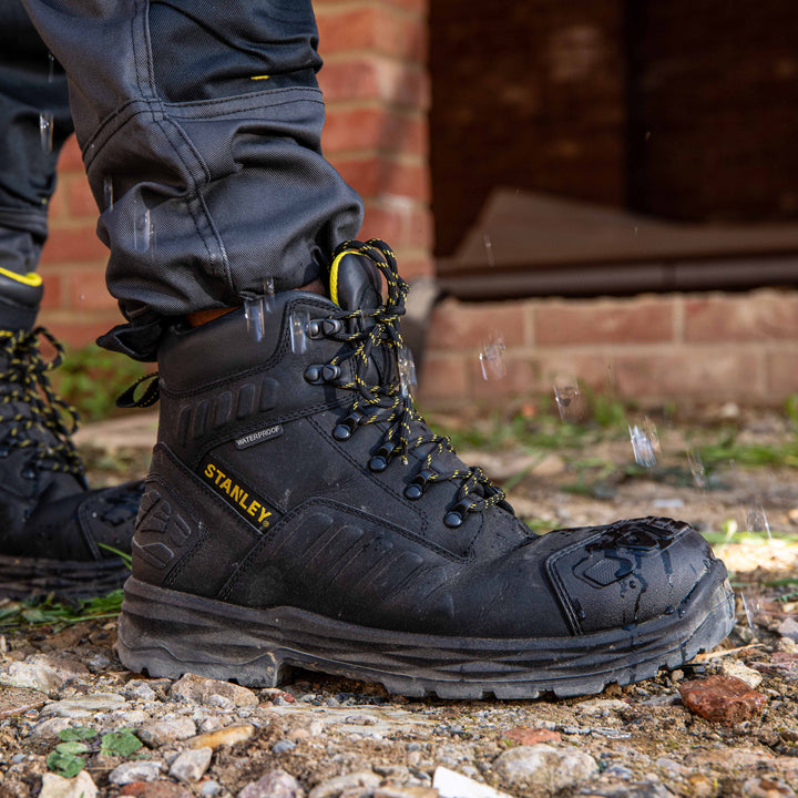 STANLEY Aramac Men's Waterproof, Steel Midsole Plate, Steel Toe Safety Work Boot, Black, Model Side View Facing Right