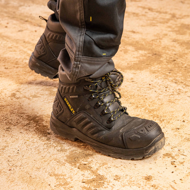 STANLEY Aramac Men's Waterproof, Steel Midsole Plate, Steel Toe Safety Work Boot, Black, Model 3/4 View Facing Right
