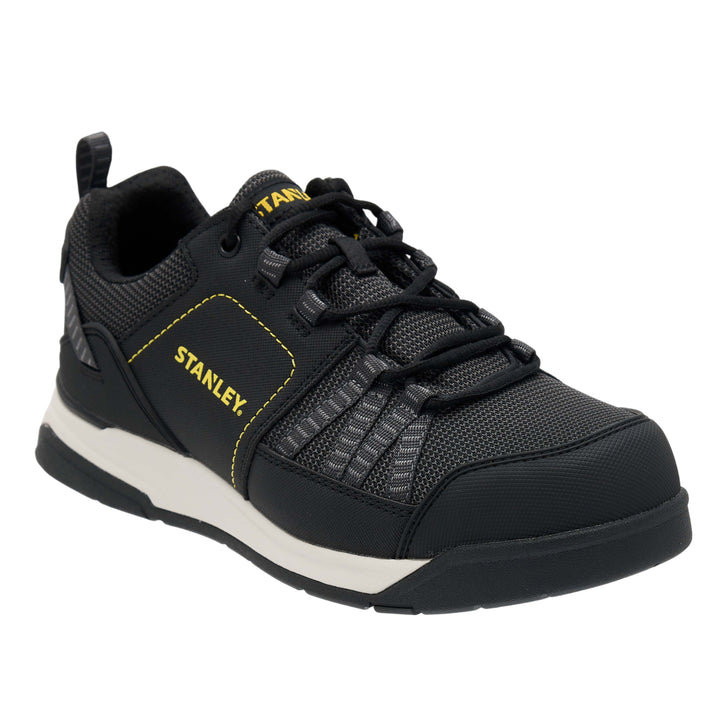 Black and gray sneaker with 'Stanley' branding on a white background