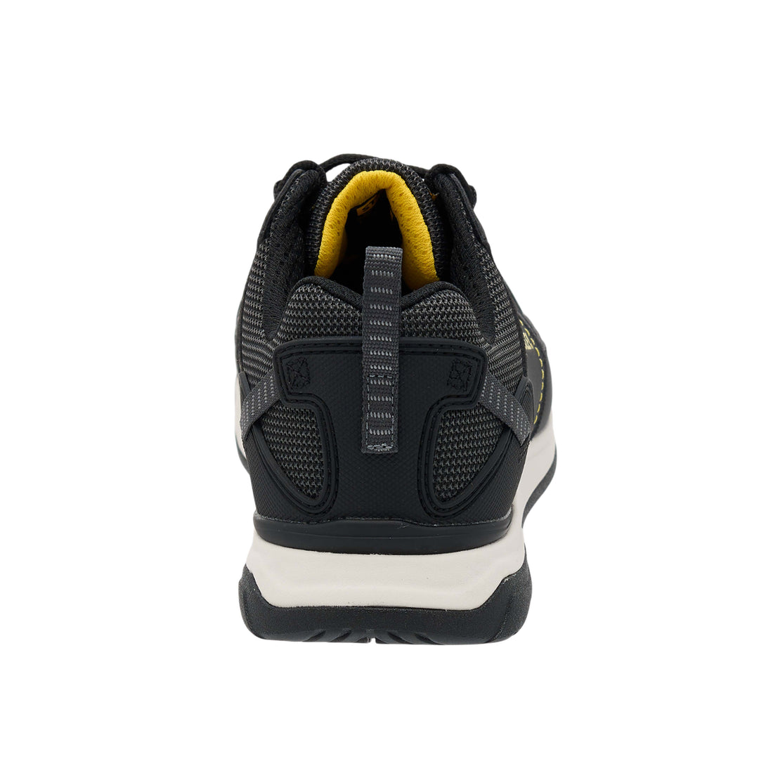 Black and yellow athletic shoe on a white background