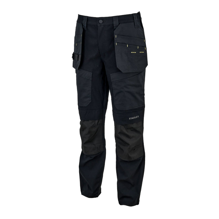 Black work pants with multiple utility pockets and reinforced knee panels, shown on a plain white background. The brand name 'STANLEY' is visible on the lower left leg.