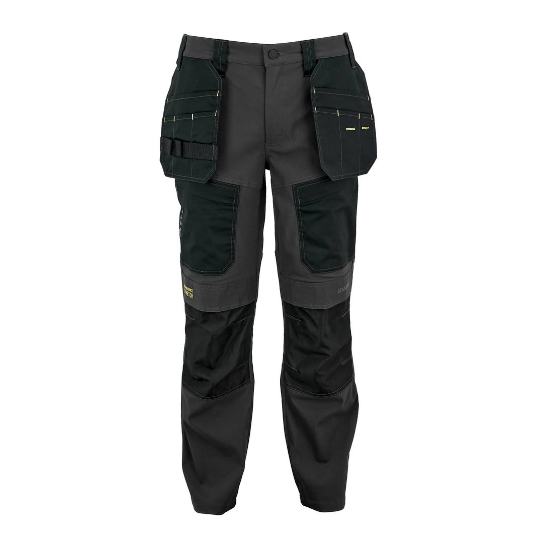 Work pants in dark gray and black with multiple utility pockets, knee panels, and reflective yellow stitching, shown against a plain white background.