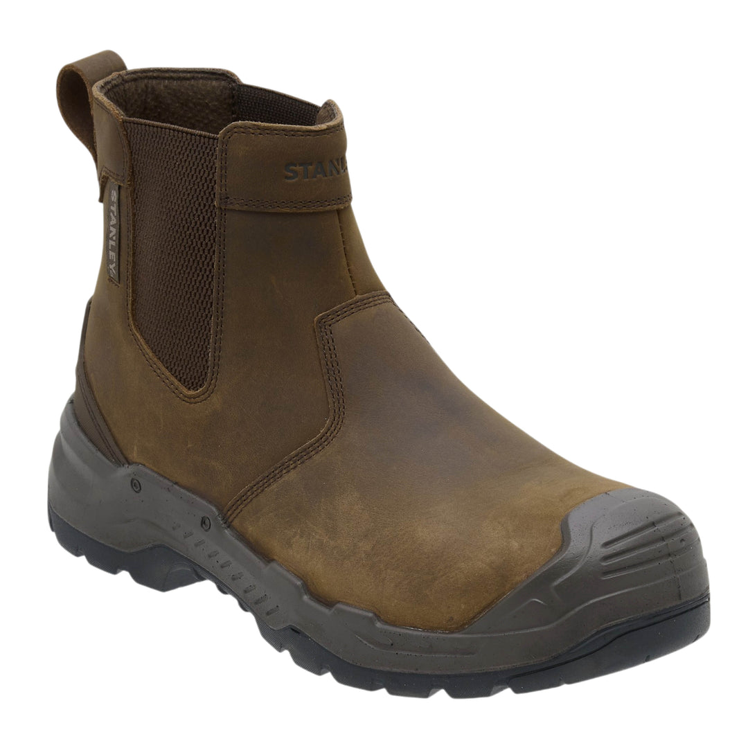 A brown leather Chelsea-style work boot with a dark gray protective toe cap and sole, shown from a three-quarters angle on a white background.