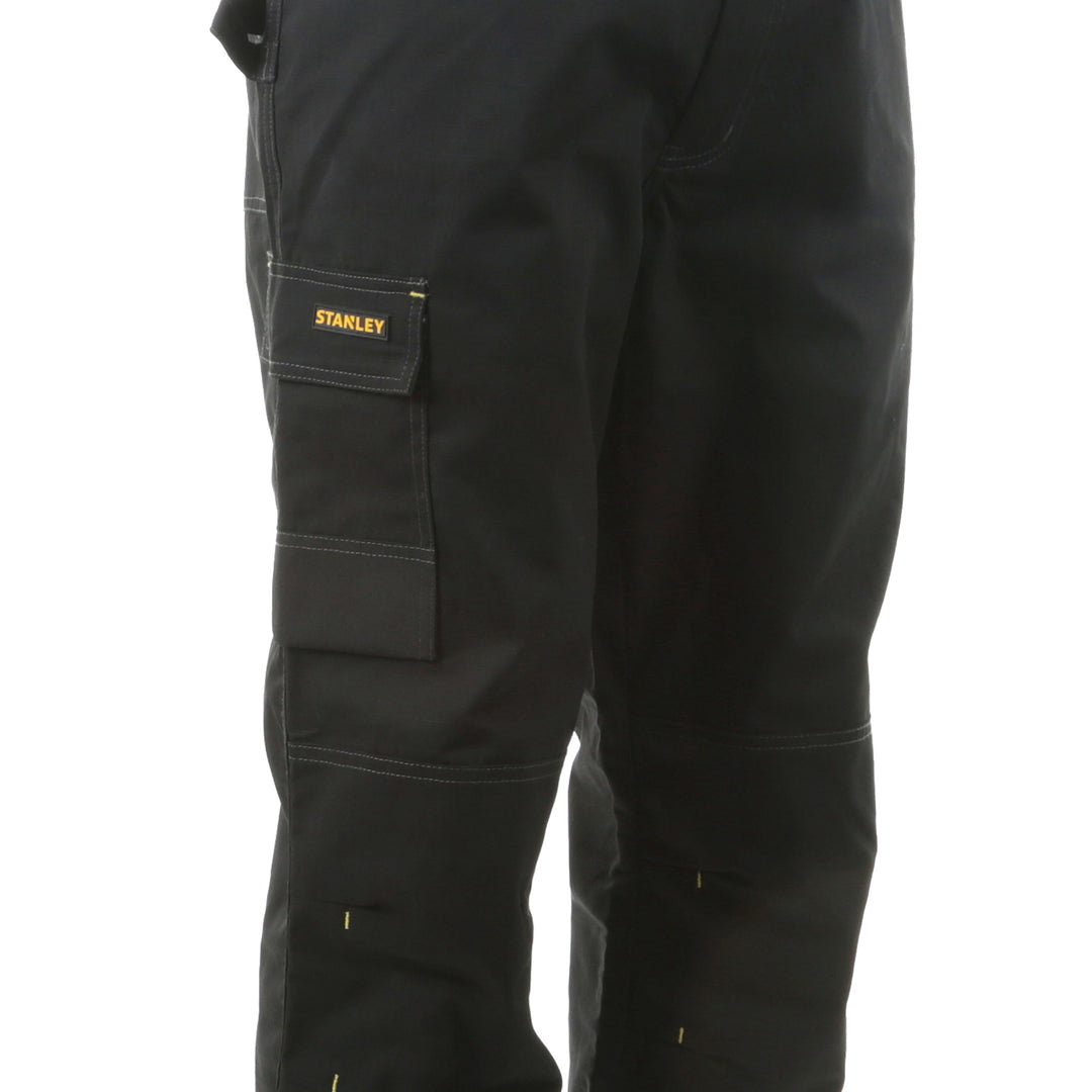 Black work pants with a Stanley logo on a white background