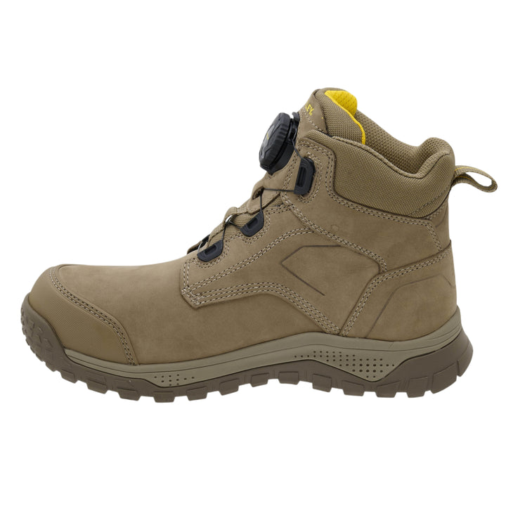 A mid-cut tactical boot in tan suede and mesh, featuring a black dial lock system on the side, a yellow accent tab at the collar, and a rugged brown sole, shown against a plain white background.
